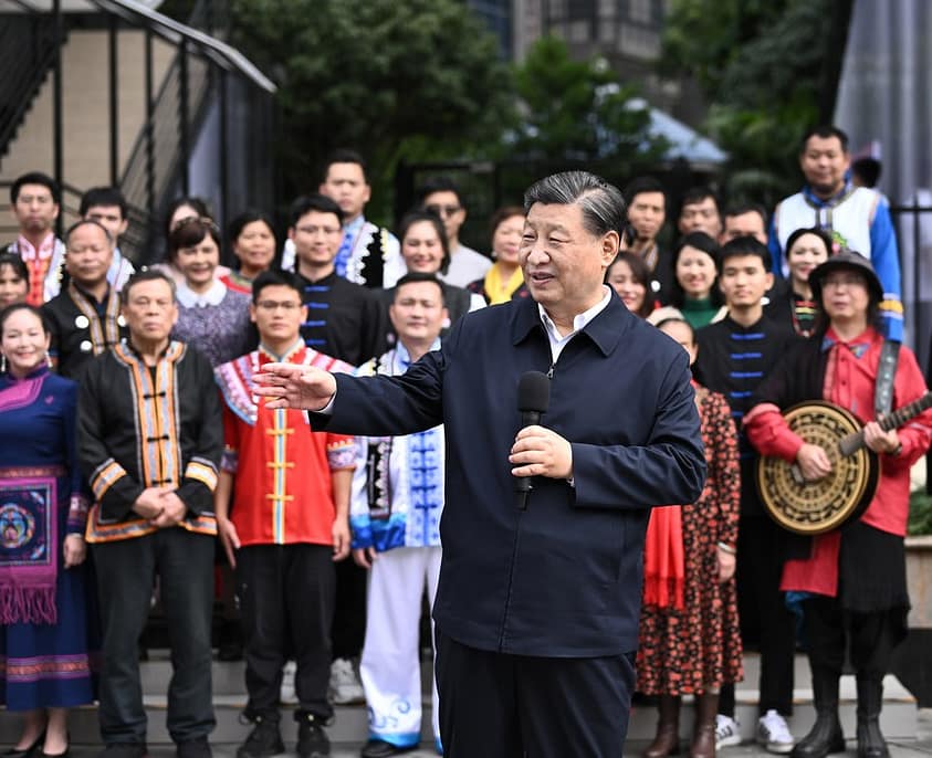 Xi Jinping, general secretary of the CPC Central Committee, communicates with residents while inspecting the Panlong community in Nanning, capital of south China's Guangxi Zhuang Autonomous Region